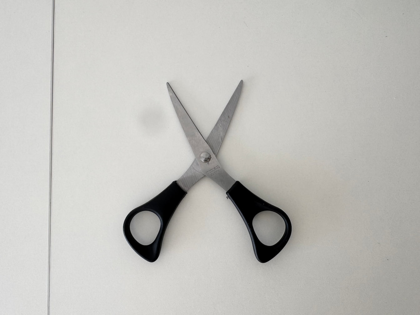The sound of scissors opening and closing