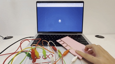 Early Makey Makey test with a paper touch controller connected to p5.js, exploring how conductive input could trigger digital reactions on screen.