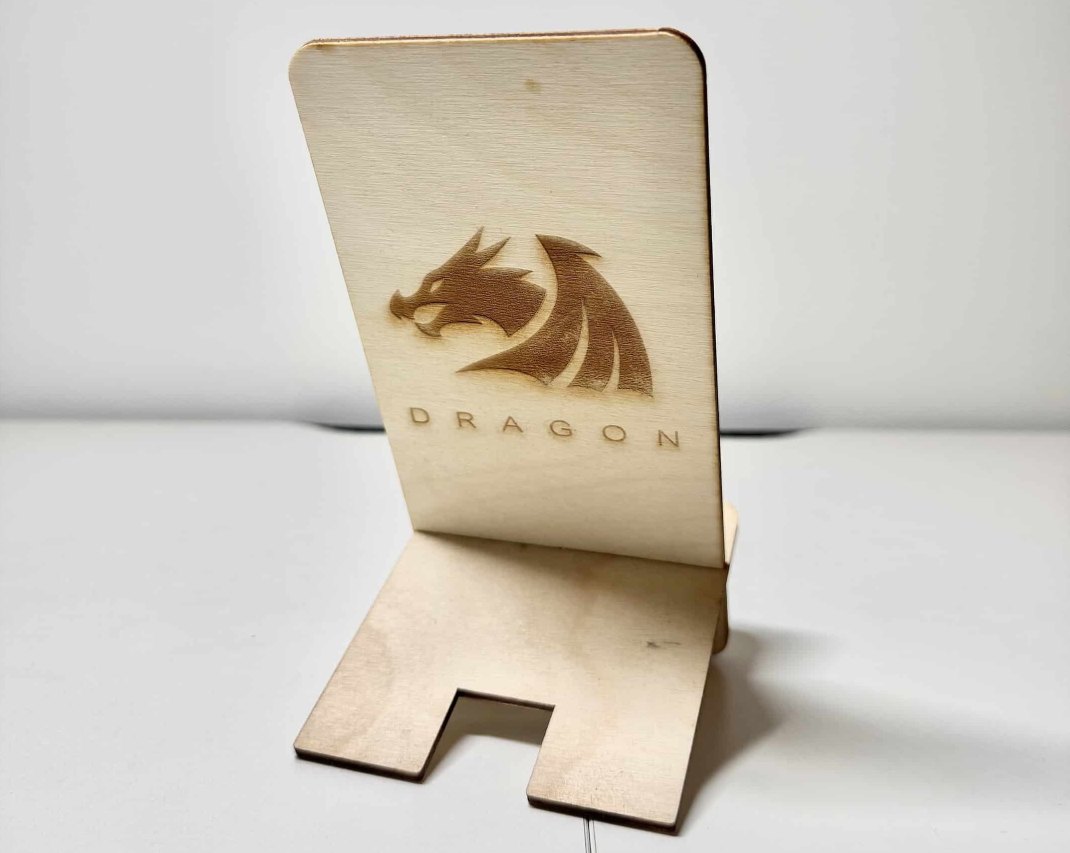 Laser cutting exploration 4 – Finally, I Assembledthe wooden pieces and completed the final form with the dragon logo engraved